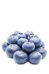 A handful of blueberries seen from above on a white background.