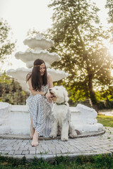 girl with bobtail and red 
gladiolus