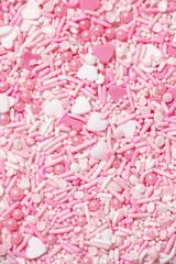 close up of pink and white heart sprinkles for valentines day