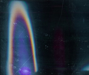 Distressed background. Rainbow lens flare. Dark old weathered grunge wallpaper with dust scratches...
