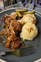 Fried liver with onion.