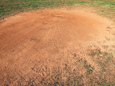 Close up of freshly prepared baseball field and raked soil