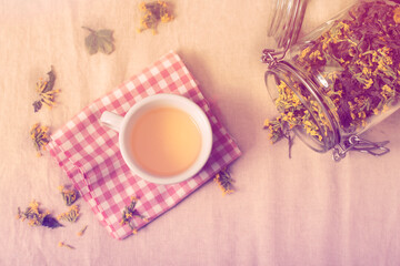 Fototapeta na wymiar Cup of tea with dried herbs. High quality photo.
