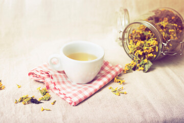 Obraz na płótnie Canvas Cup of tea with dried herbs. High quality photo.