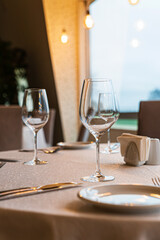  Served dinner table in a restaurant. Restaurant interior