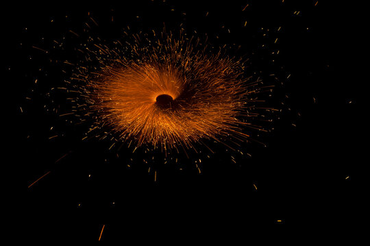 Rotating Firecrackers in black background