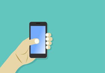 Ein männliche Hand hält ein Smartphone über einem türkisen Hintergrund.