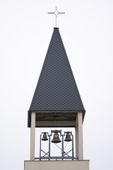 church tower with three bells