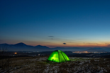 Tent at sunrise in the carpathians