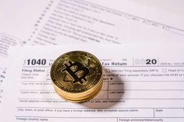 Form 1040 for 2020 with bitcoin coins for reporting of gains from cyber currency trading or investment