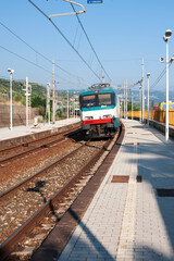 Obraz premium A train about to arrive at the station of Pisciotta, Salerno, Italy.