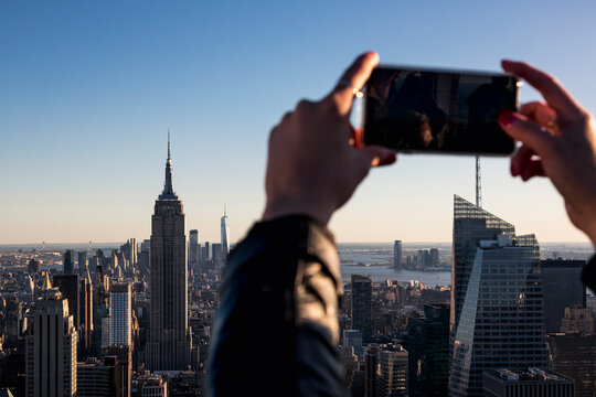 Taking a picture of Manhattan skyline, New York City.