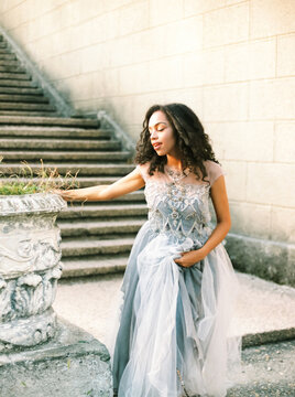Young sensual woman in wonderful dress