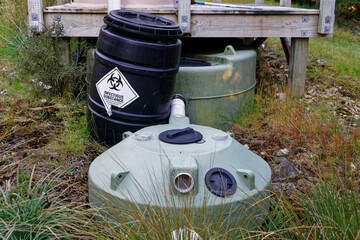 Septic tank with infectious substance barrel, living off the grid in New Zealand.