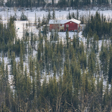 high angle view of a small village covered with snow amidst forest,Yukon
