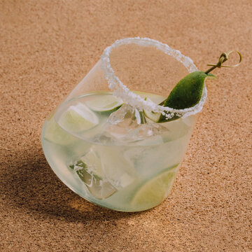 Caipirinha Cocktail on Cork-Looking Bar Surface