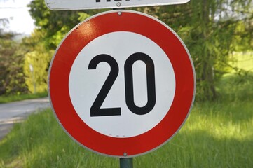 20 kilometers per hour speed limit sign