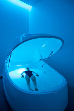 Relaxed woman during sensory deprivation float experience