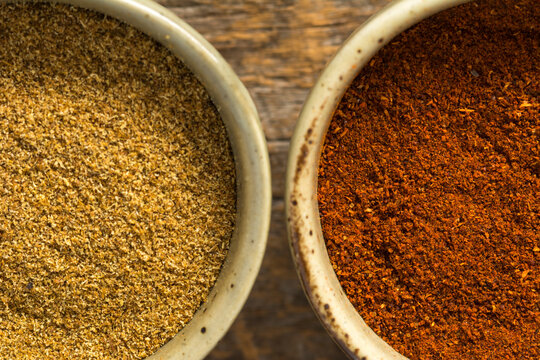Bowls of Cumin and Chili Together in Closeup