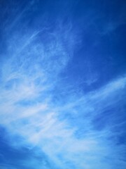blue sky with feathery white clouds nature