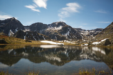 Ibon de Anayet and the Portalet with the bottom the Anayet peak. Concept famous mountains of the Aragonese Pyrenees