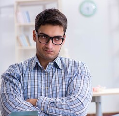 Medical student studying in classroom