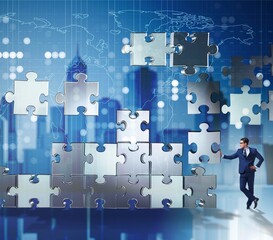 Business concept of teamwork with puzzle pieces
