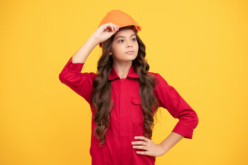 improve your childhood. future engineer. making repairs. teen girl in protective hard hat.