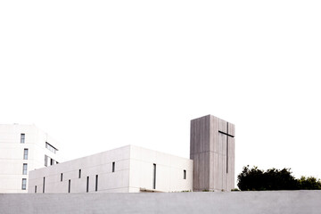 Fototapeta na wymiar Modern monastery of recent construction, isolated with high concrete walls, white background.