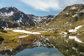 Ibon de Anayet and the Portalet with the bottom the Anayet peak. Concept famous mountains of the...