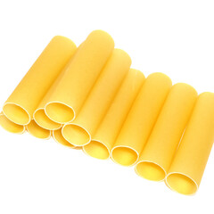 Row yellow cannelloni pasta isolated on white background