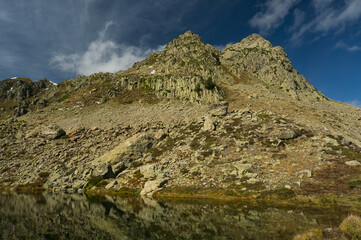 Ibon de Anayet and the Portalet with the bottom the Anayet peak. Concept famous mountains of the...
