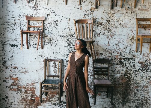 Female artist in cool studio setting
