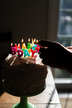 Lighting birthday cake candles