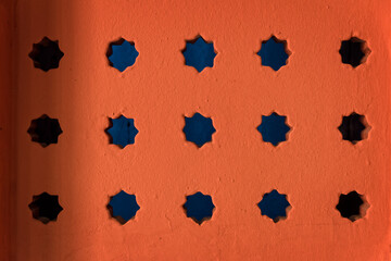 Ornamental lattice in an african wall, Morocco