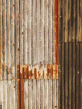 Corrugated iron sheets on a rusting barn. Derbyshire, UK.