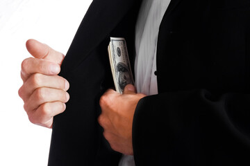 Business man holding money on white background