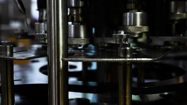 Close up shot of automatic beverage filling machine starting progress warm up, Industrial Factory back to rerun business. 