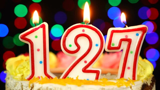 Number 127 Happy Birthday Cake With Burning Candles Topper.