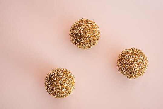 Three Christmas golden ball decorations