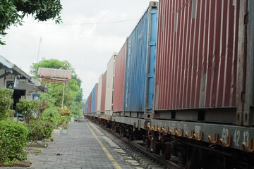 Fototapeta na wymiar trains carrying Indonesian logistical goods