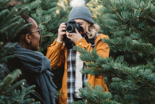 Best friends shopping for a Christmas tree