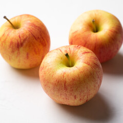 Red apple fruit on white background