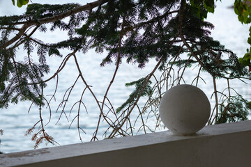 Spruce branches and round white ball fencing