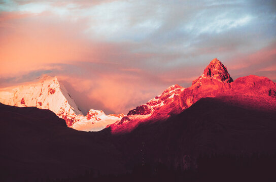 Beautiful and surreal sunset over Peruvian Andes; amazing Cordillera Blanca seen from Huaraz region