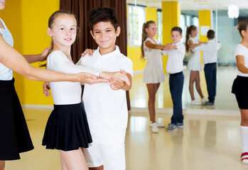 Portrait children studying of partner dance at dance school