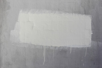 A smudge of paint on the concrete wall.Texture.