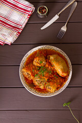 Cabbage rolls with meat, rice and vegetables. Chou farci, dolma, sarma, golubtsi or golabki. View from above, top view