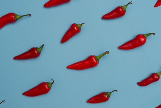 Red Chili Peppers On Blue