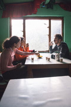 friends in a restaurant in India